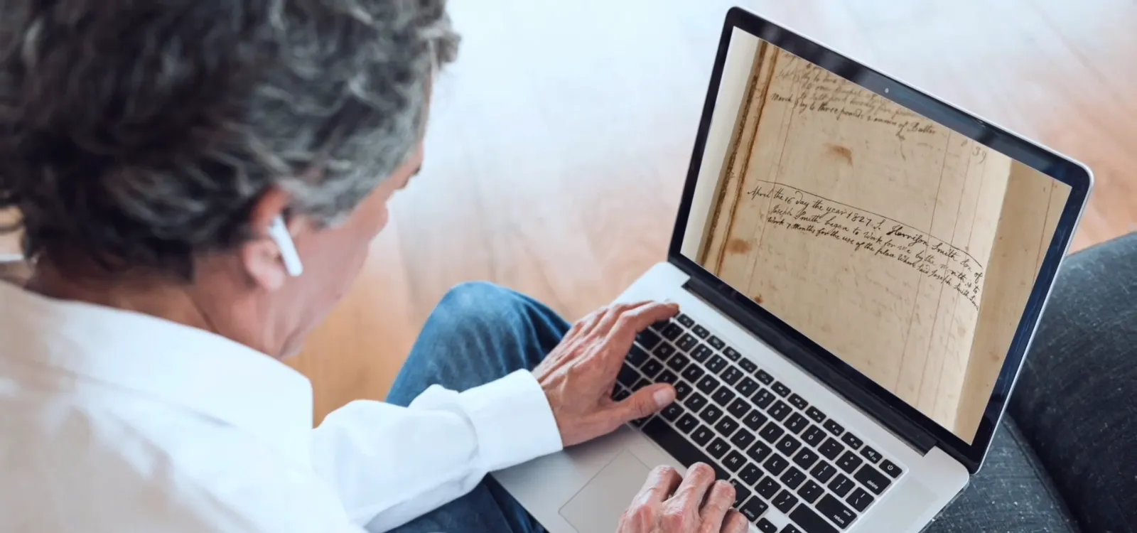 An old handwritten journal entry displayed on a laptop screen